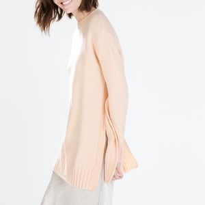 BLUSH SWEATER WITH SIDE VENTS